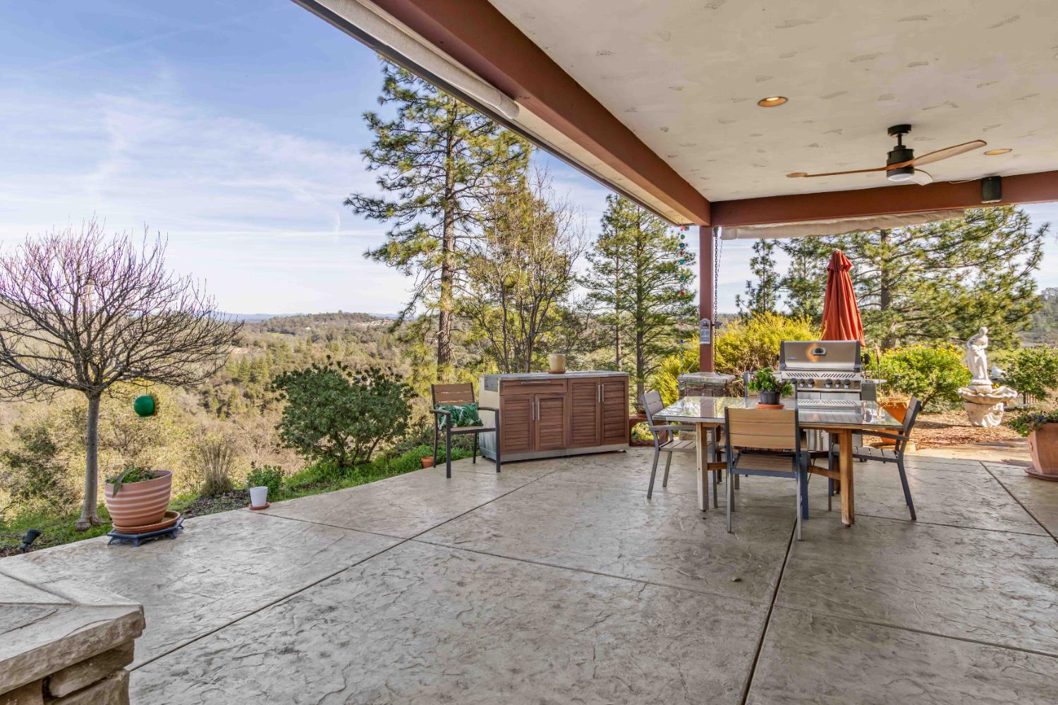 5390 Lost Creek Road Shingle Springs, CA 95682 - Photo 38 of 81 The back patio outside the kitchen window.