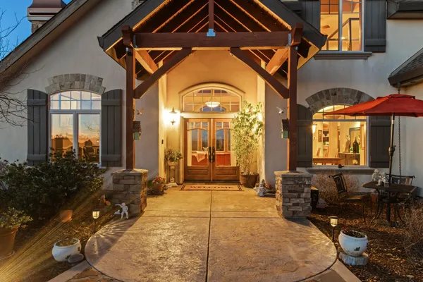 a bed room with a bed and a ceiling fan