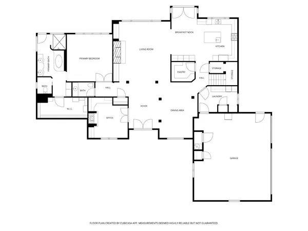a aerial view of a house with a big yard and large trees