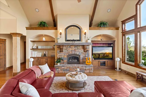 a kitchen with a table and chairs