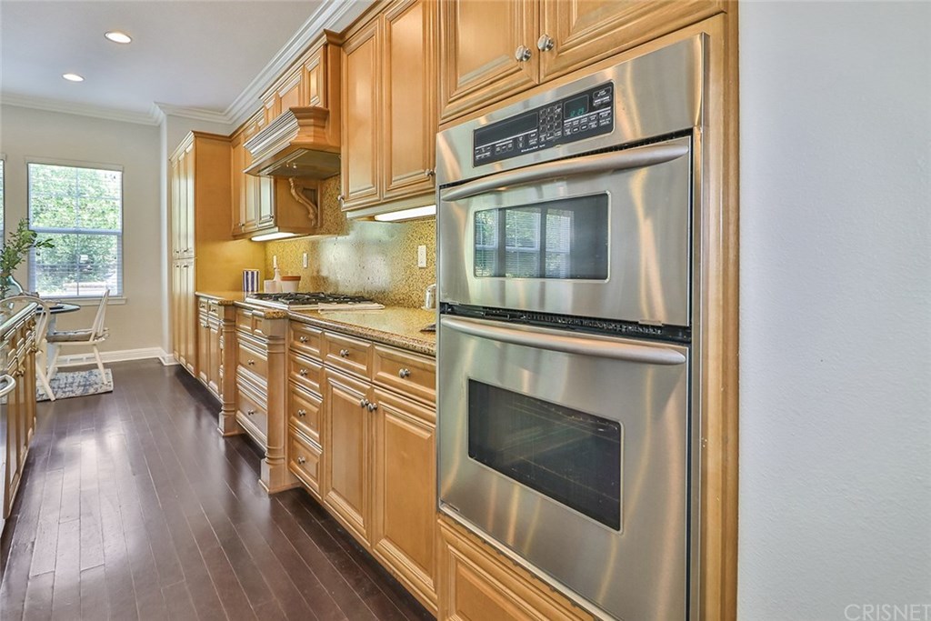 2948 Milestone Avenue Simi Valley, CA 93065 - Photo 24 of 70 Wood floors, stunning cabinets in the kitchen and double oven