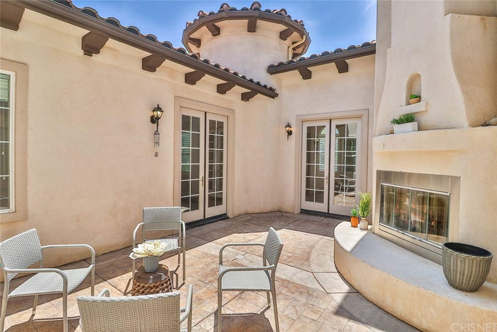 2948 Milestone Avenue Simi Valley, CA 93065 - Photo 37 of 70 courtyard in the middle of the house offers a beautiful wood burning fireplace