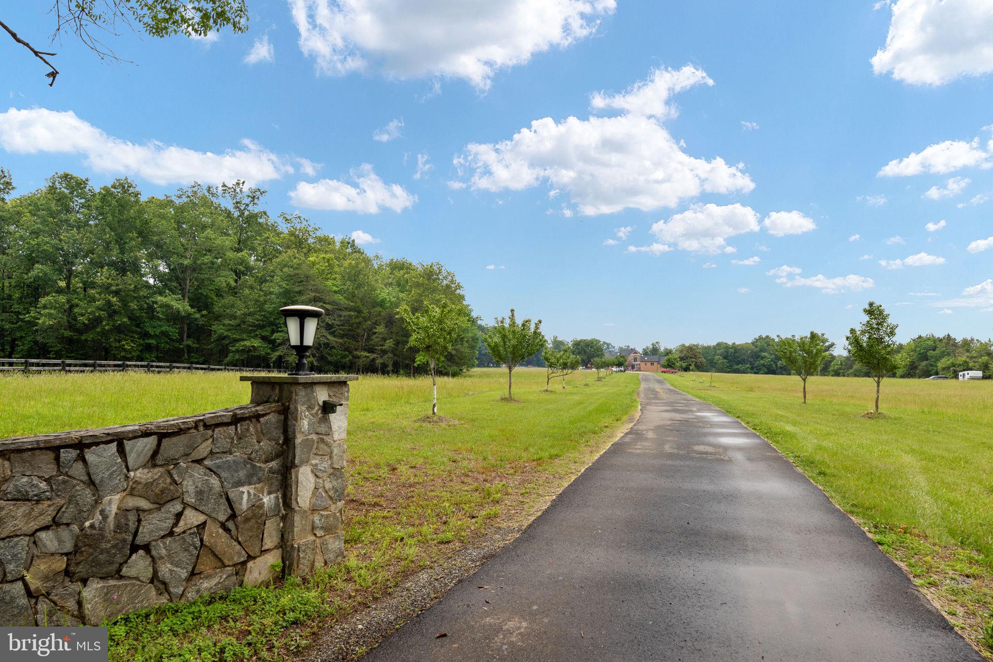 6119 Beach Road Midland, VA 22728 - Photo 4 of 98 a view of a lake with a big yard
