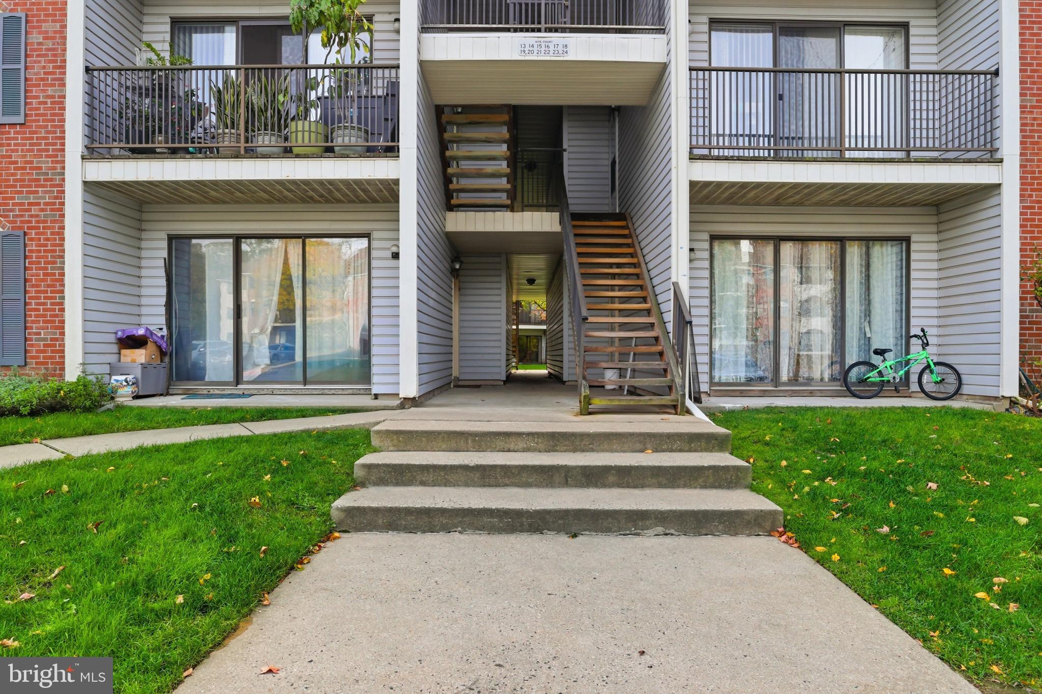 21 Kite Court Lawrenceville, NJ 08648 - Photo 1 of 30 a front view of a house with a yard