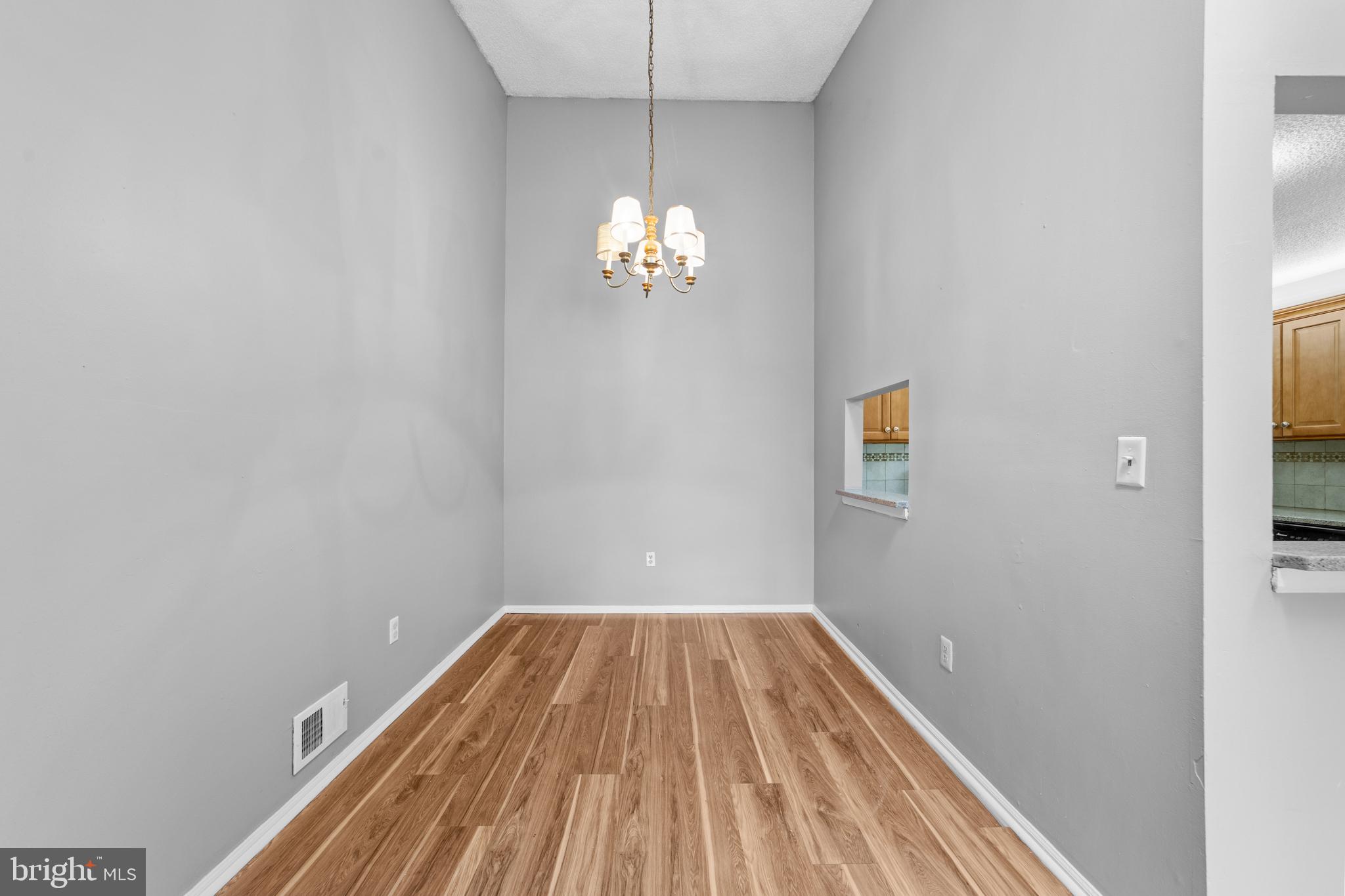 21 Kite Court Lawrenceville, NJ 08648 - Photo 12 of 30 a view of a room with wooden floor