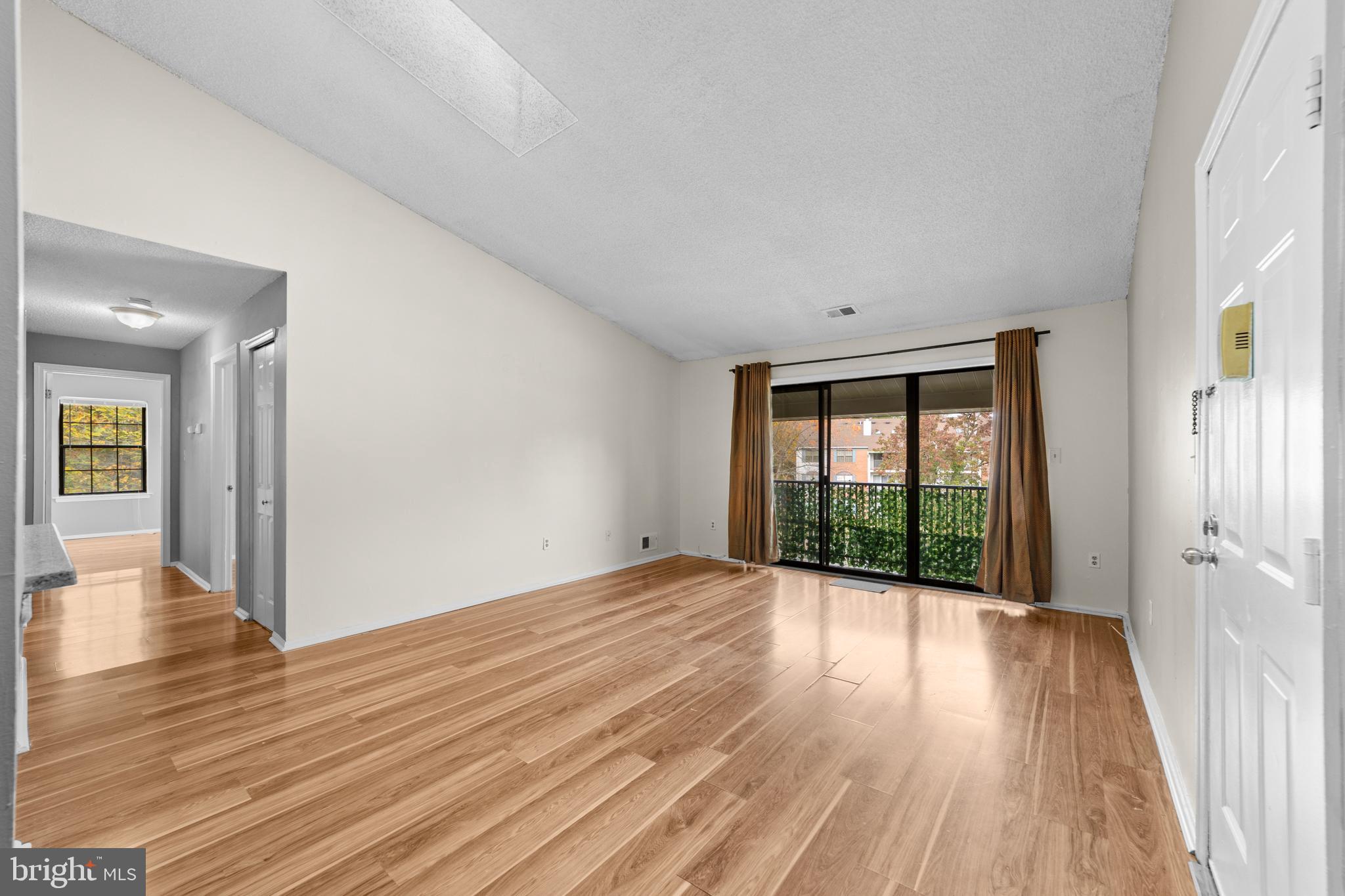 21 Kite Court Lawrenceville, NJ 08648 - Photo 15 of 30 wooden floor in an empty room with a window