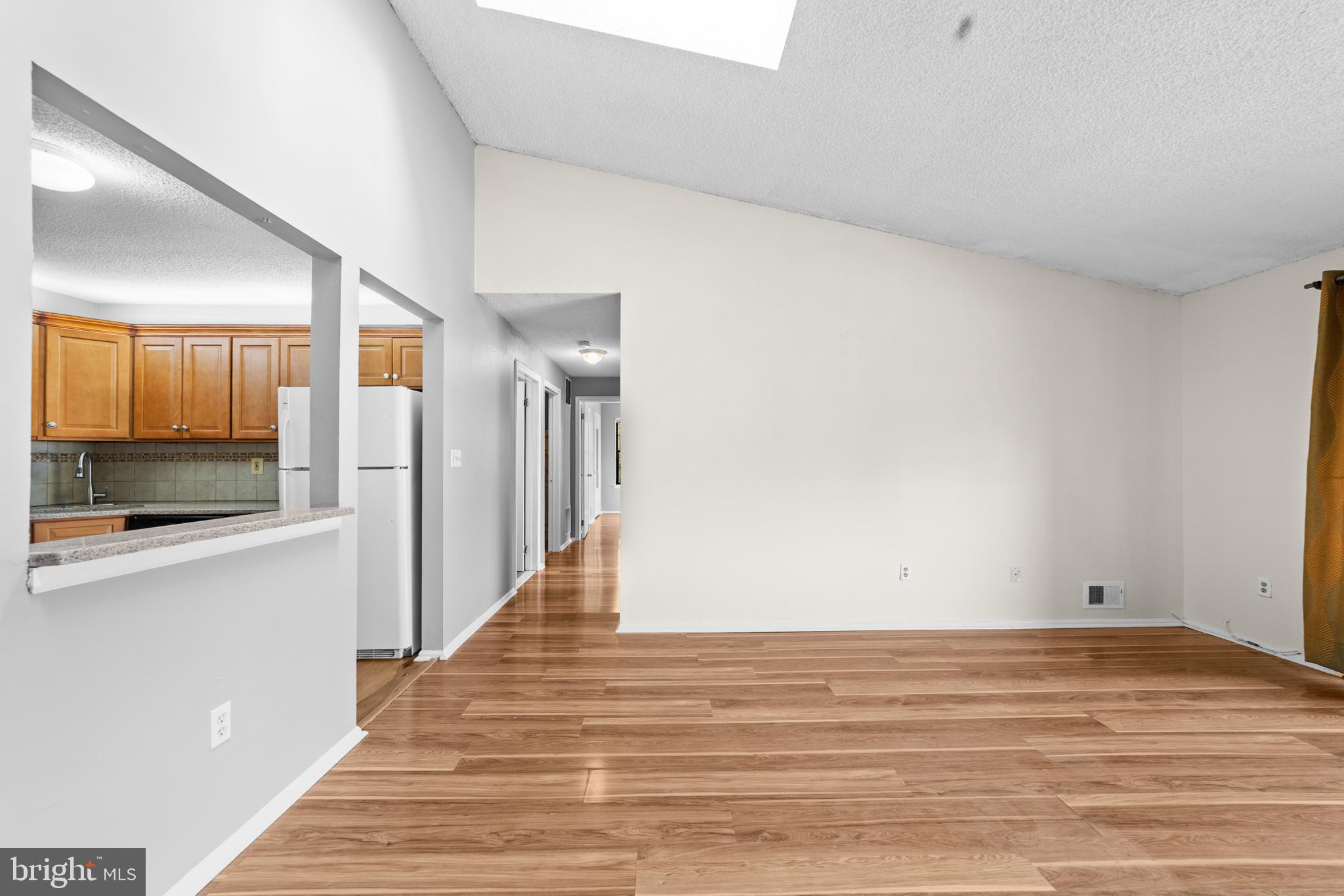 21 Kite Court Lawrenceville, NJ 08648 - Photo 16 of 30 a view of a room with wooden floor and staircase