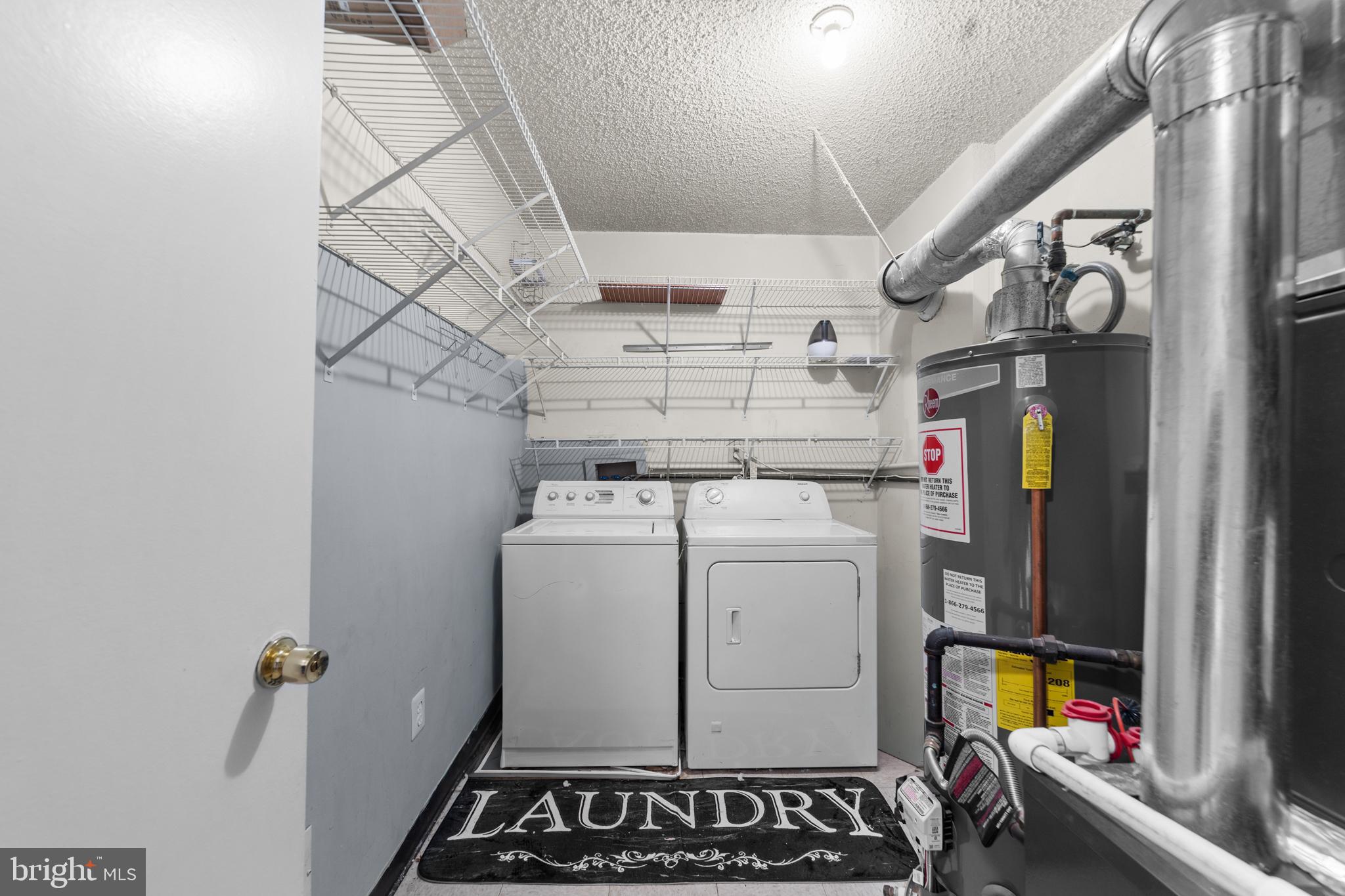 21 Kite Court Lawrenceville, NJ 08648 - Photo 22 of 30 a utility room with dryer and washer