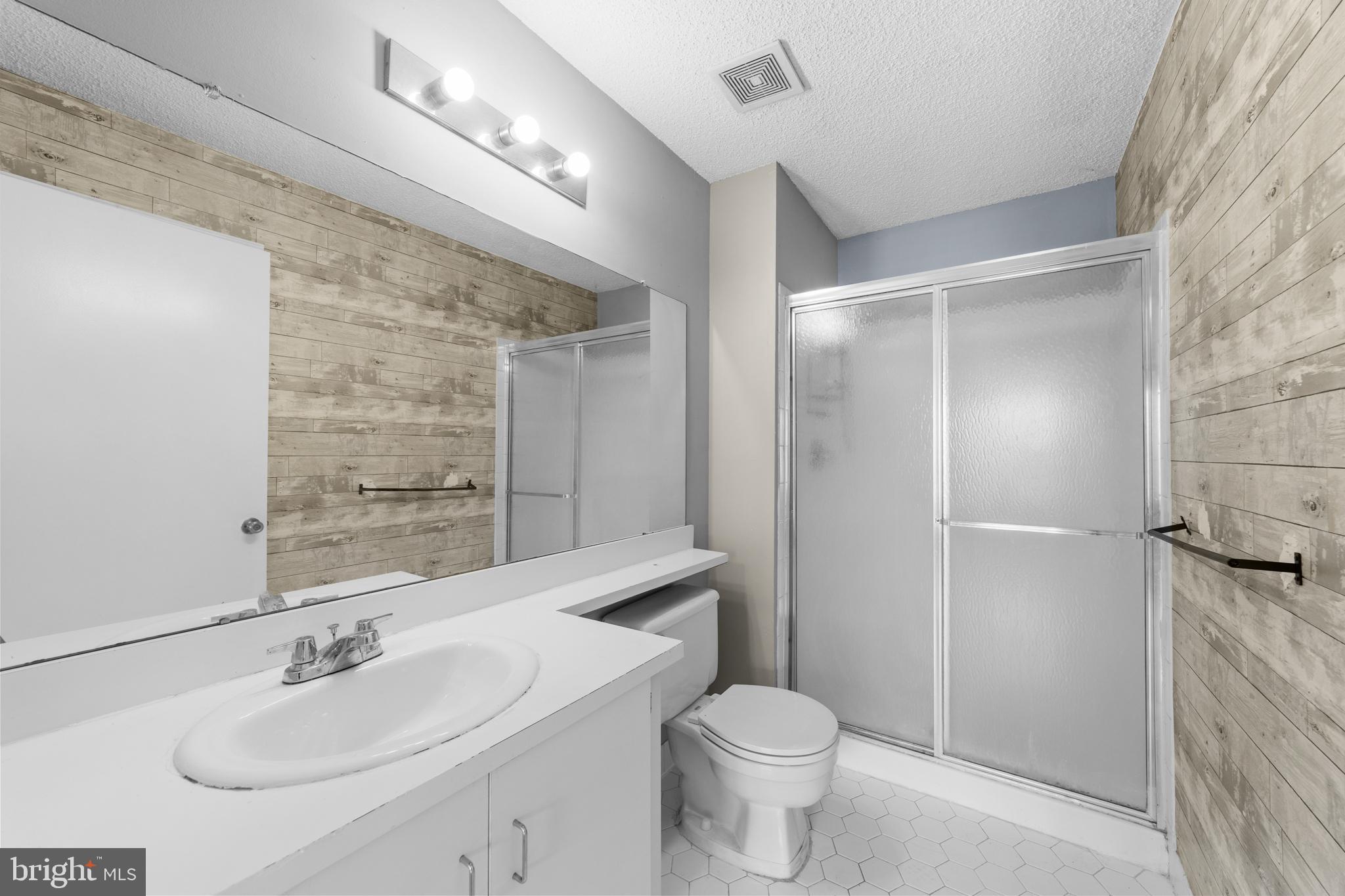 21 Kite Court Lawrenceville, NJ 08648 - Photo 24 of 30 a bathroom with a sink toilet and shower