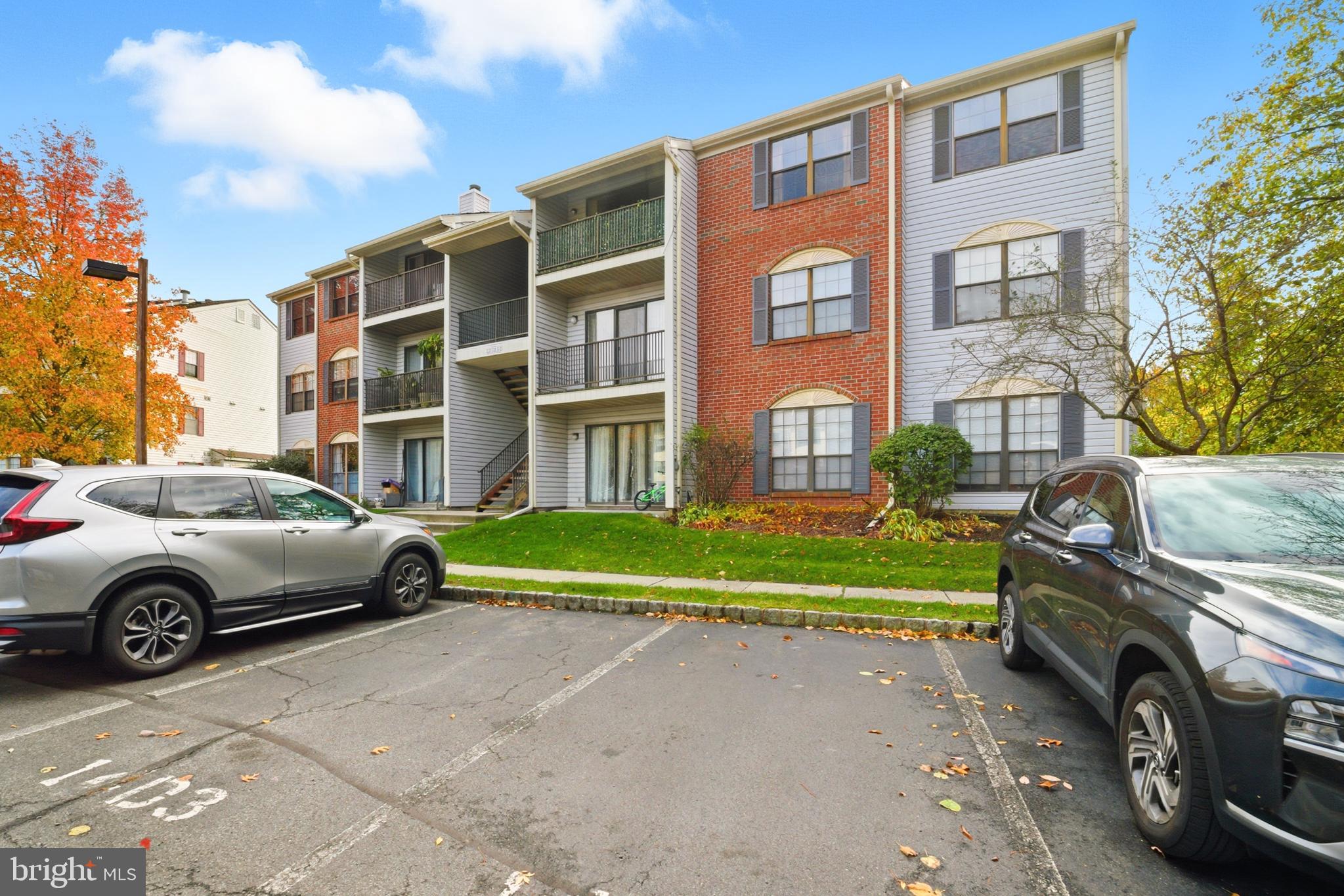 21 Kite Court Lawrenceville, NJ 08648 - Photo 3 of 30 a front view of a house with parking space