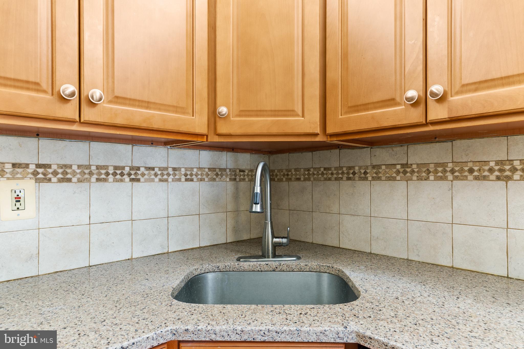 21 Kite Court Lawrenceville, NJ 08648 - Photo 10 of 30 a kitchen with a sink and cabinets