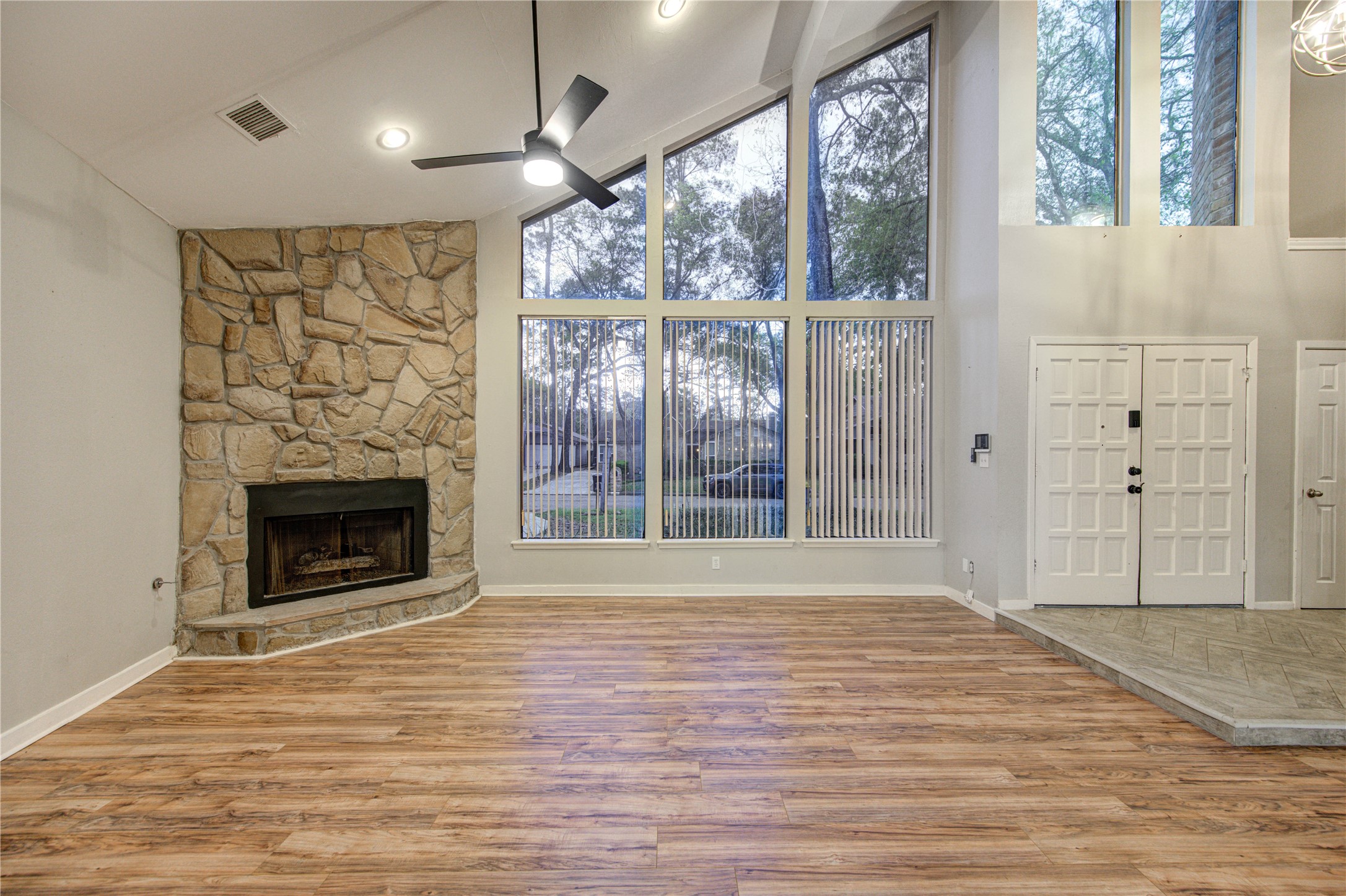 530 Enchanted Lane Spring, TX 77388 - Photo 6 of 26 a view of a livingroom with a fireplace and window