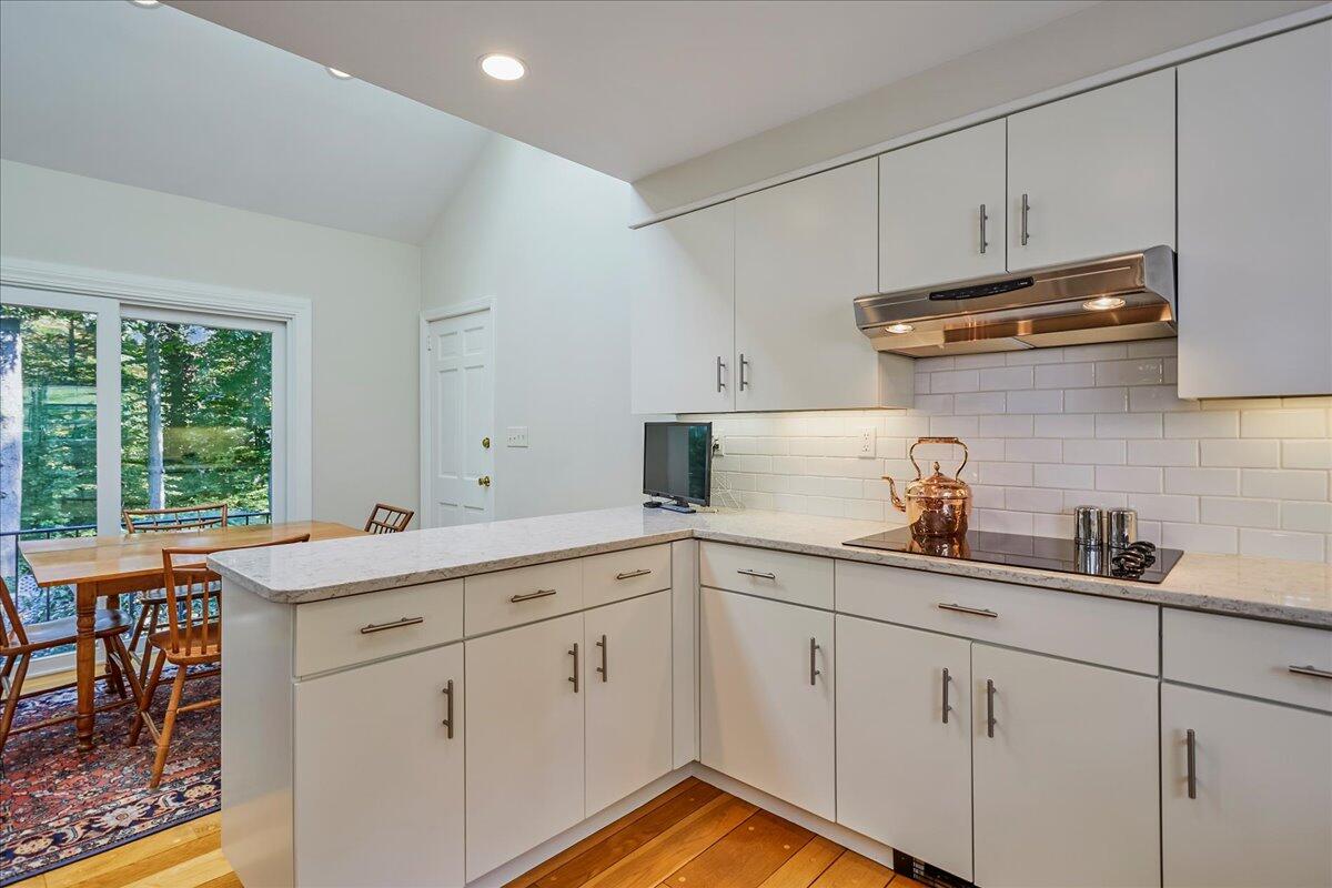 110 Ridge Acres Road Darien, CT 06820 - Photo 14 of 30 a kitchen with white cabinets and sink