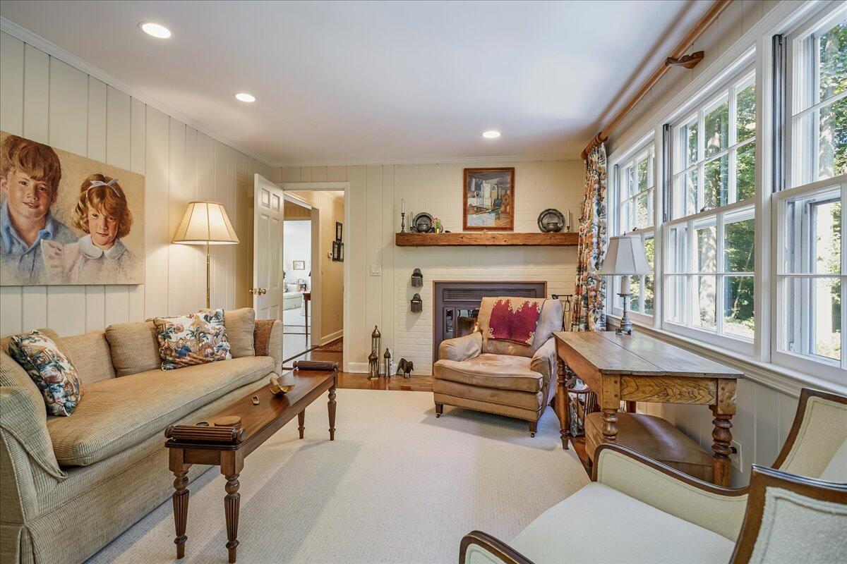 110 Ridge Acres Road Darien, CT 06820 - Photo 16 of 30 a living room with furniture and a fireplace