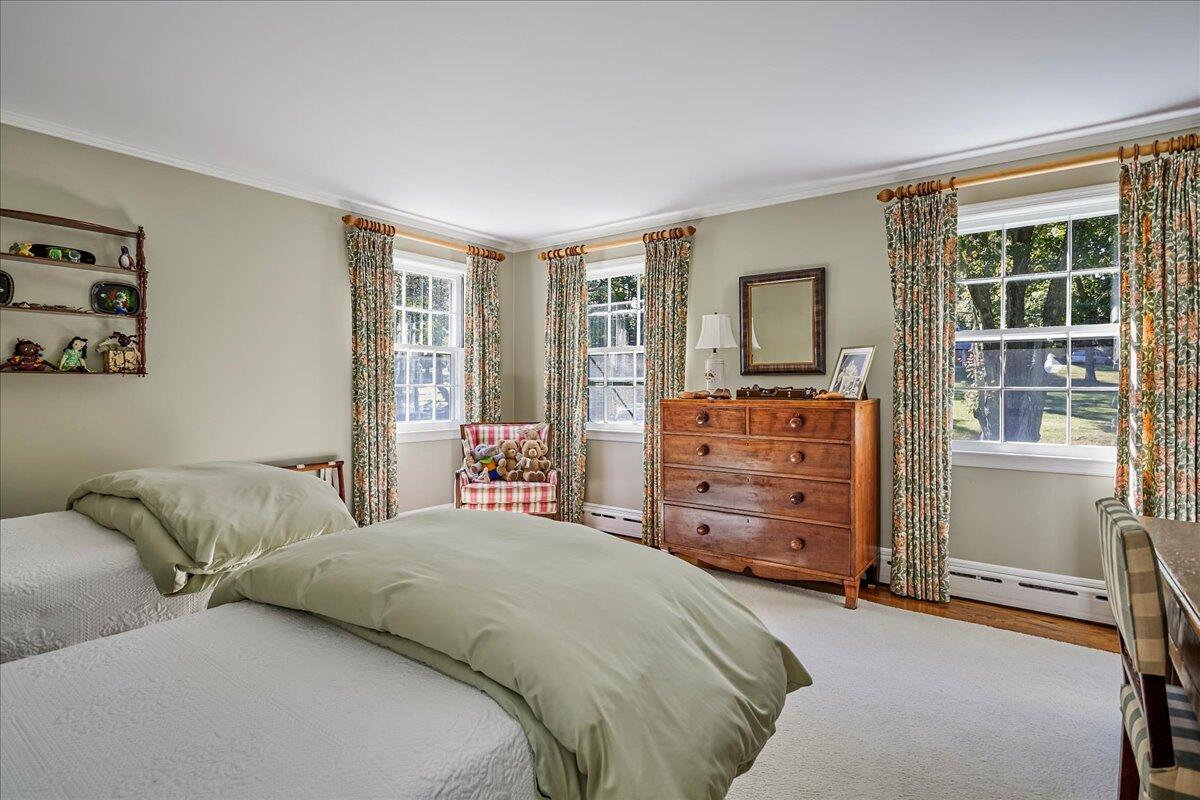 110 Ridge Acres Road Darien, CT 06820 - Photo 20 of 30 a bedroom with a bed and a dresser