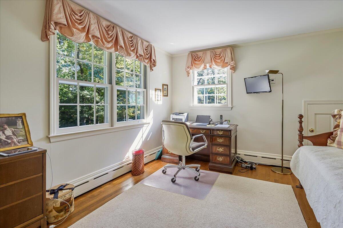 110 Ridge Acres Road Darien, CT 06820 - Photo 22 of 30 a view of a workspace with furniture and a window
