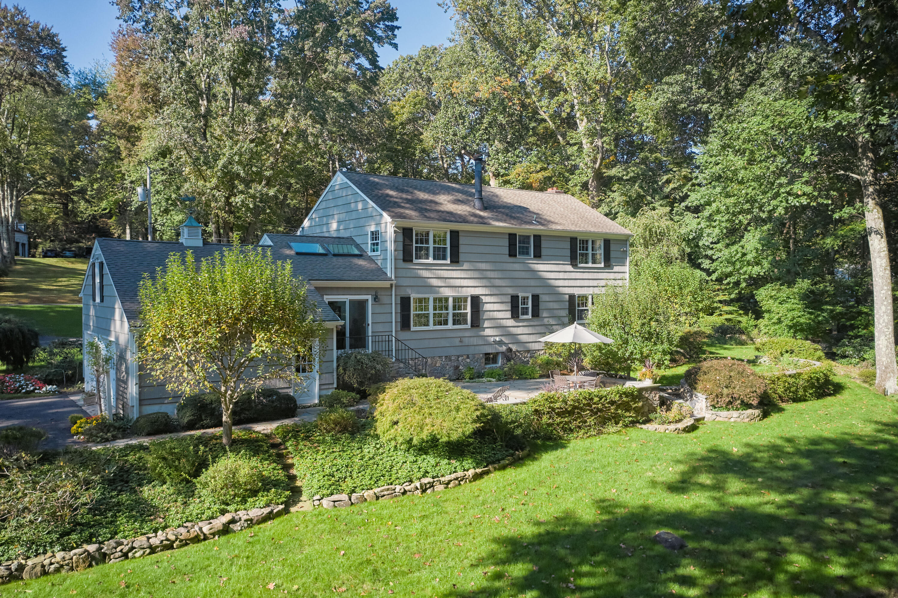 110 Ridge Acres Road Darien, CT 06820 - Photo 27 of 30 a front view of a house with a yard