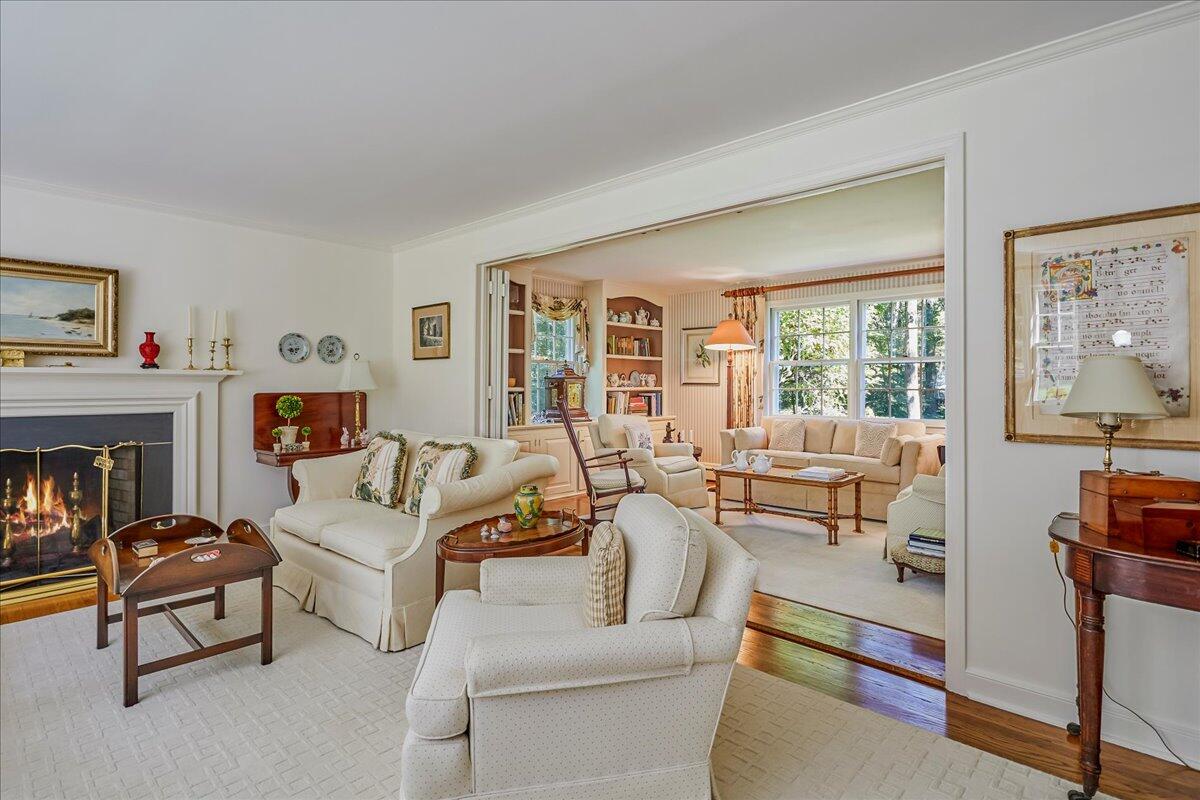 110 Ridge Acres Road Darien, CT 06820 - Photo 7 of 30 a living room with furniture and a fireplace