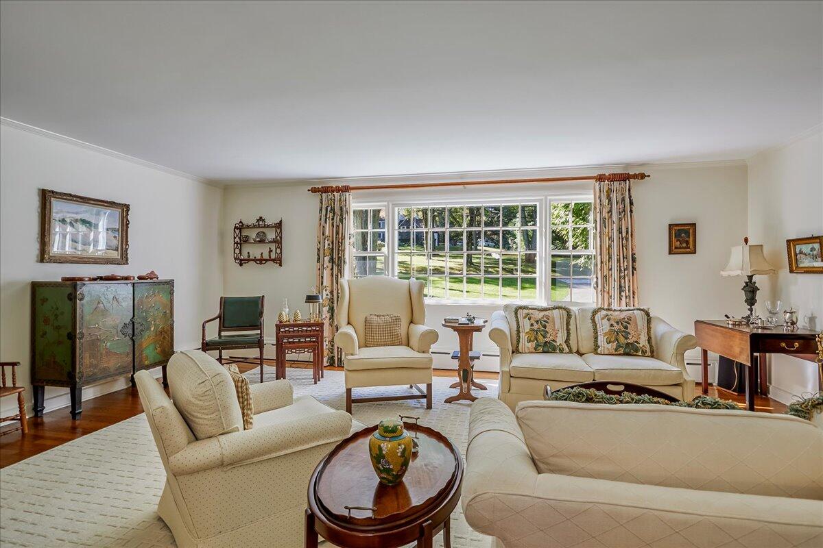 110 Ridge Acres Road Darien, CT 06820 - Photo 8 of 30 a living room with furniture and a large window
