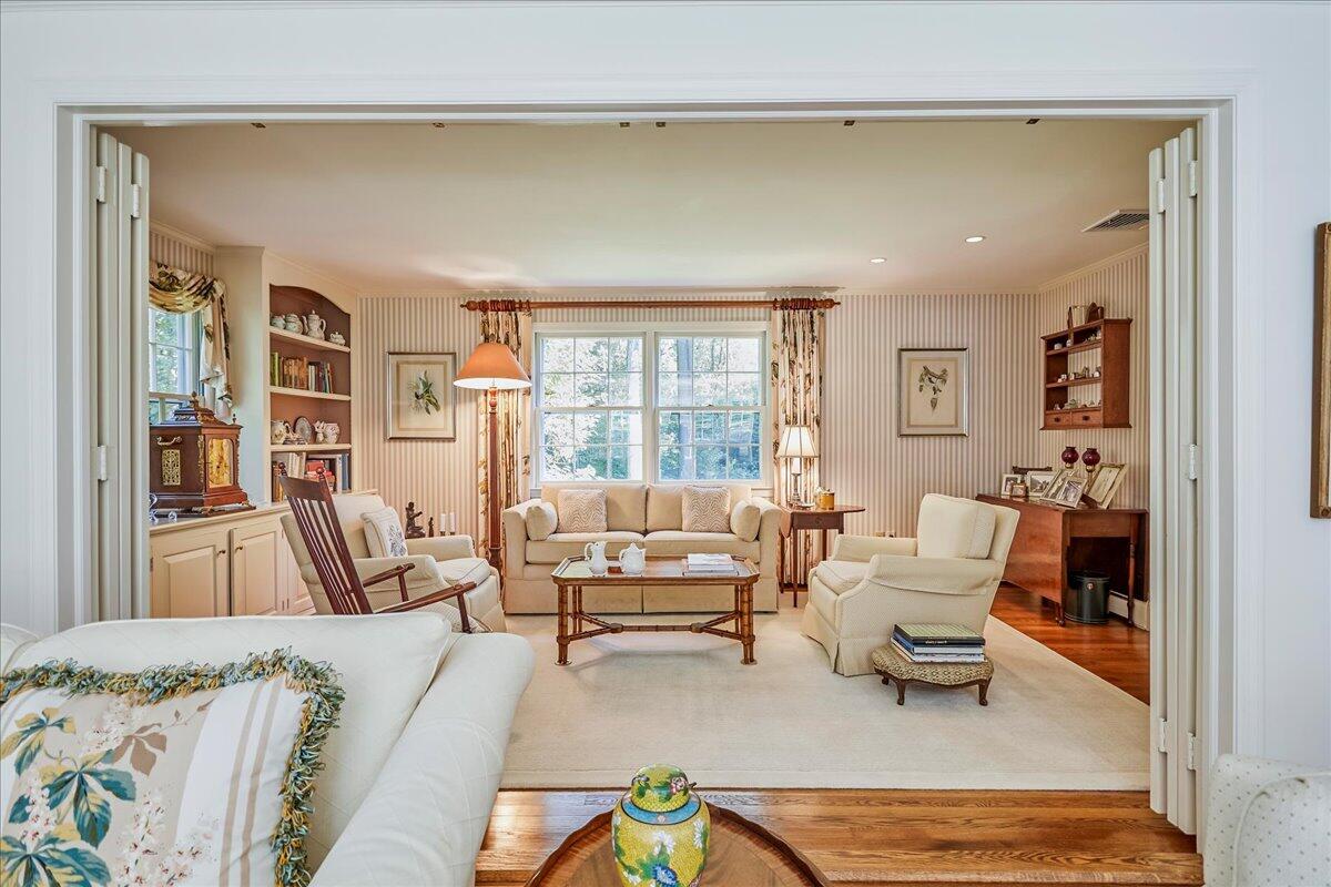 110 Ridge Acres Road Darien, CT 06820 - Photo 9 of 30 a living room with furniture and a large window