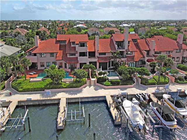 6549 Southeast South Marina Way Stuart, FL 34996 - Photo 1 of 2 an aerial view of multiple houses with yard