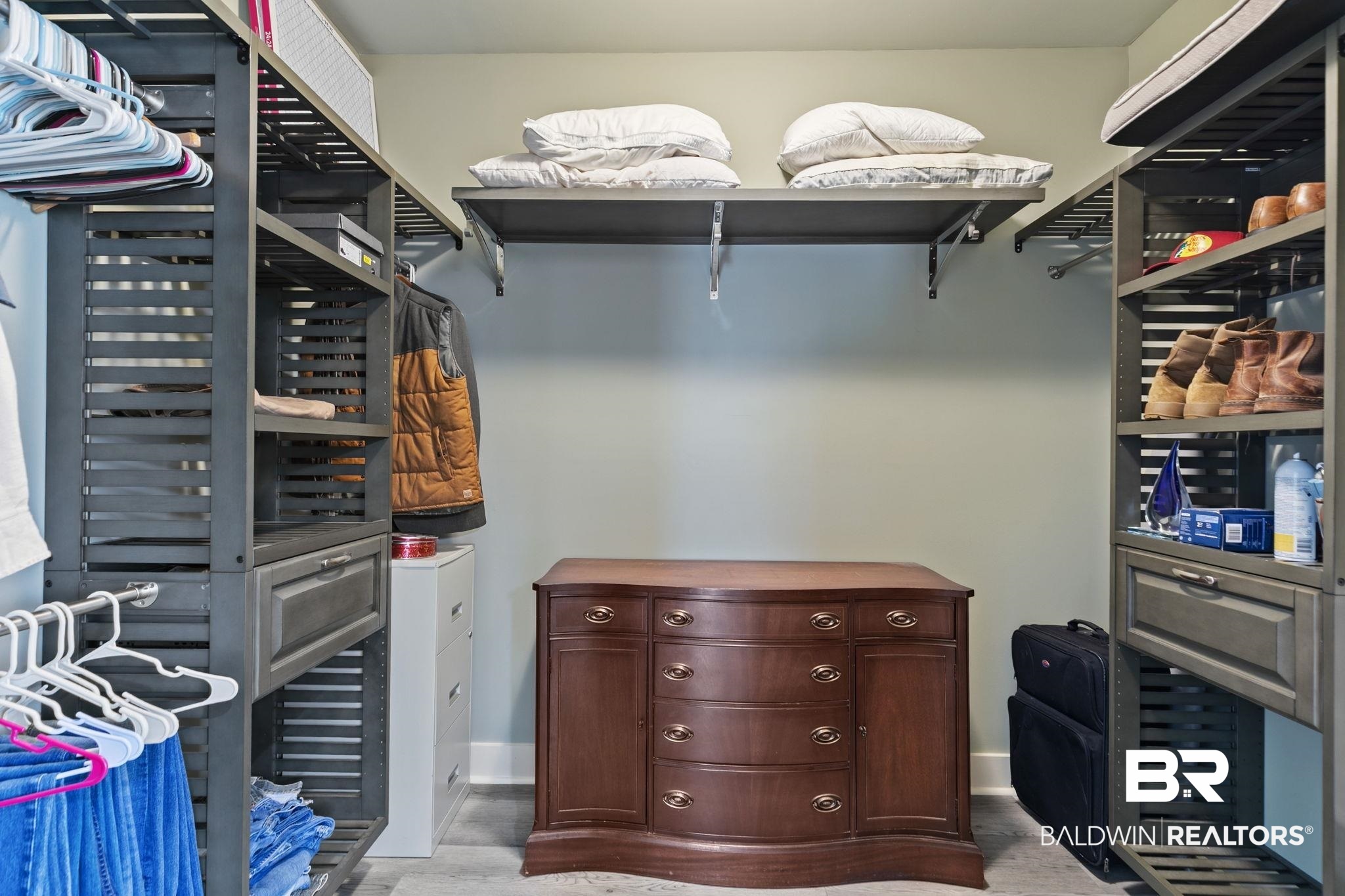 9584 Sanibel Loop Daphne, AL 36526 - Photo 28 of 48 Walk in closet with light wood-type flooring