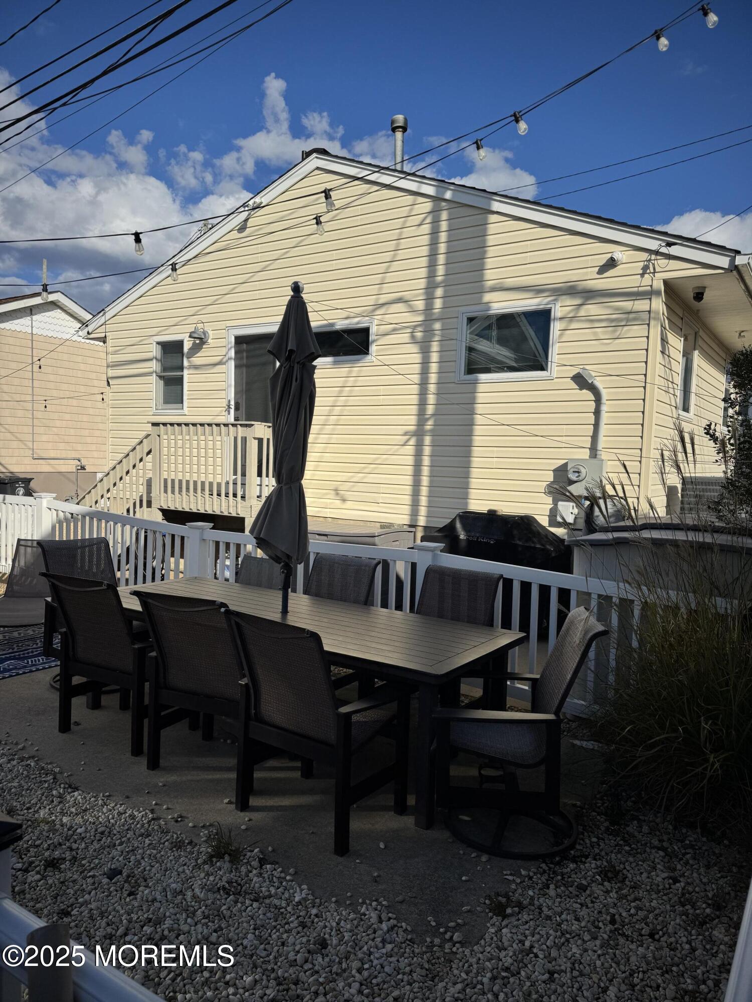 120 West Chadwick Way Lavallette, NJ 08735 - Photo 3 of 13 a balcony with table and chairs