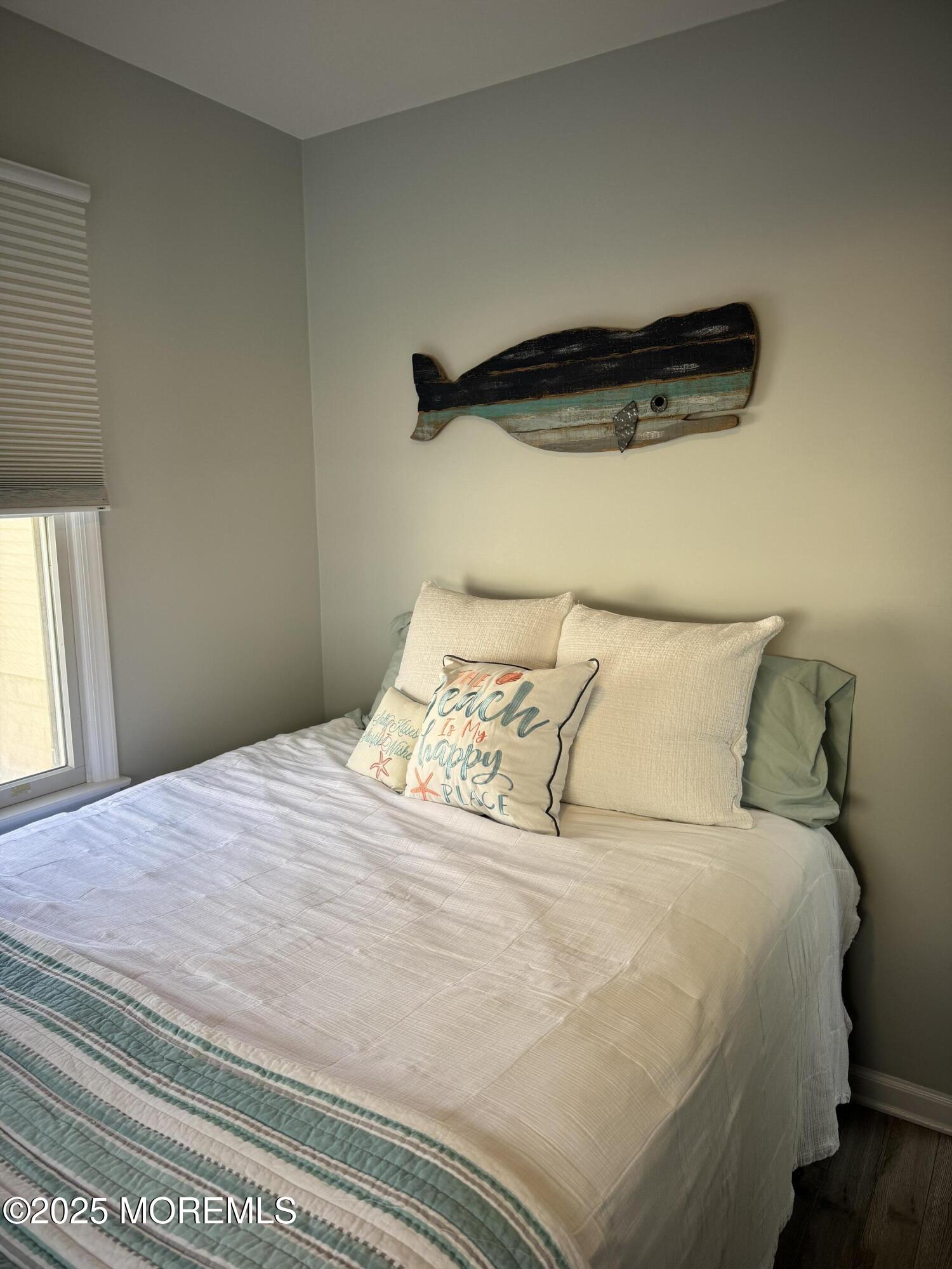 120 West Chadwick Way Lavallette, NJ 08735 - Photo 9 of 13 a bedroom with a bed and a window
