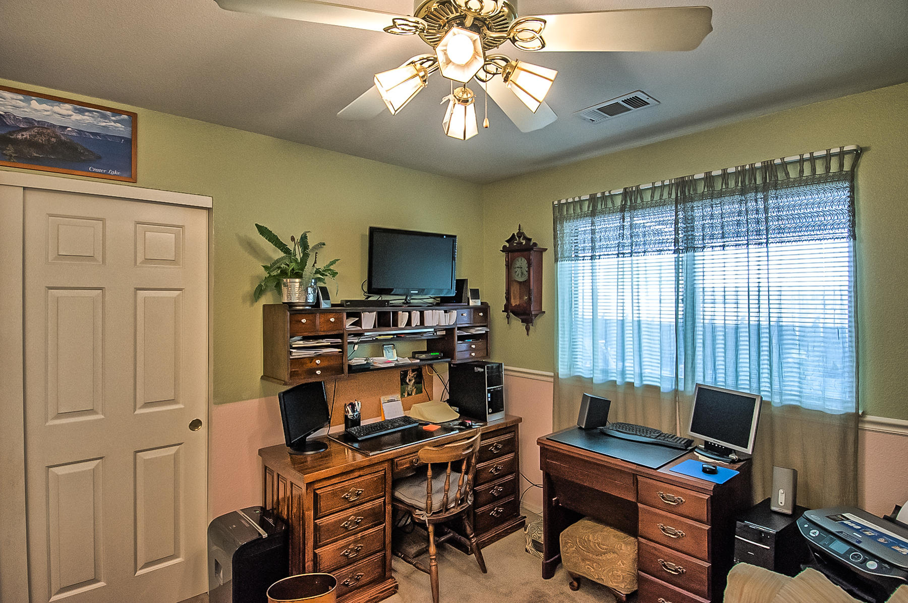 11326 Puffin Way Redding, CA 96003 - Photo 15 of 26 a view of a workspace with furniture and a window