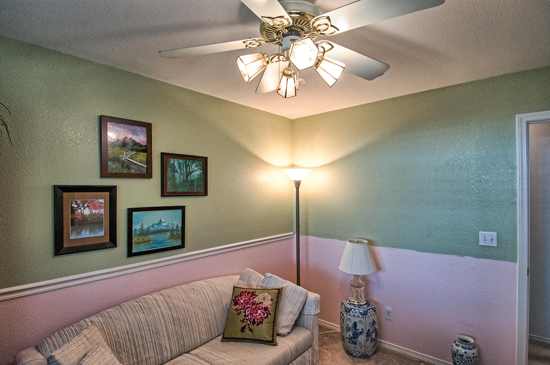 11326 Puffin Way Redding, CA 96003 - Photo 16 of 26 a living room with furniture and a chandelier