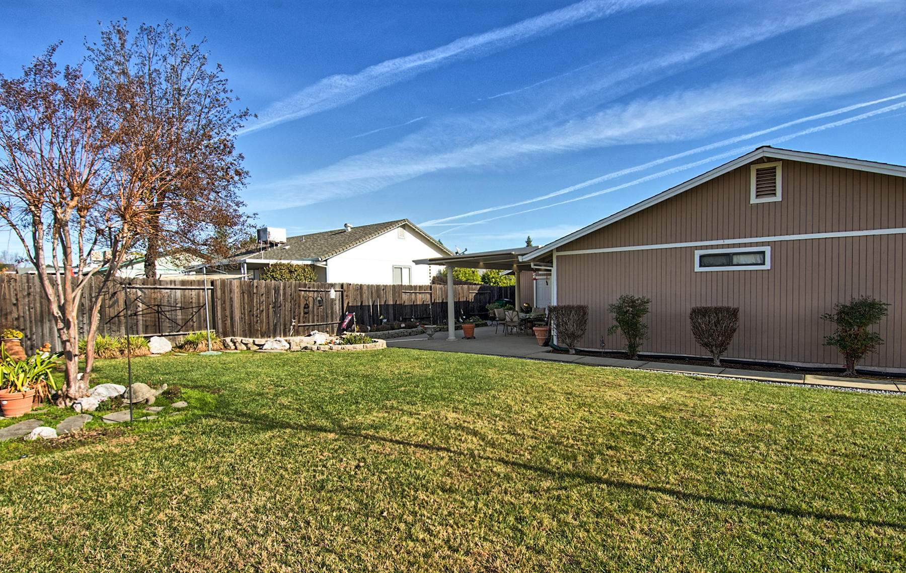 11326 Puffin Way Redding, CA 96003 - Photo 26 of 26 a view of a backyard with a garden