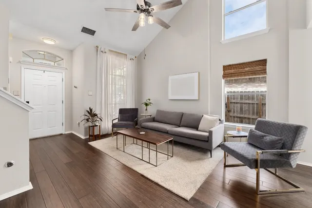 a living room with furniture and a window