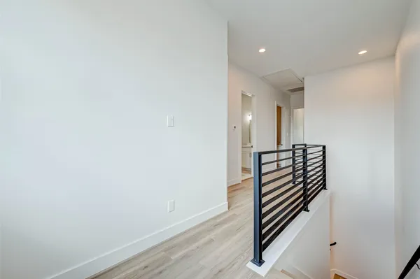 a view of entryway with wooden floor