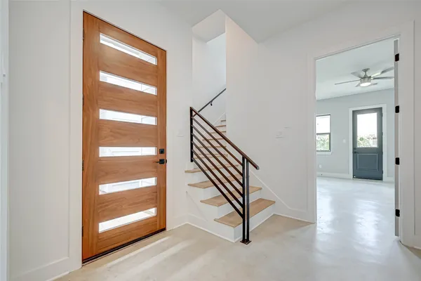 a view of a hallway with entryway