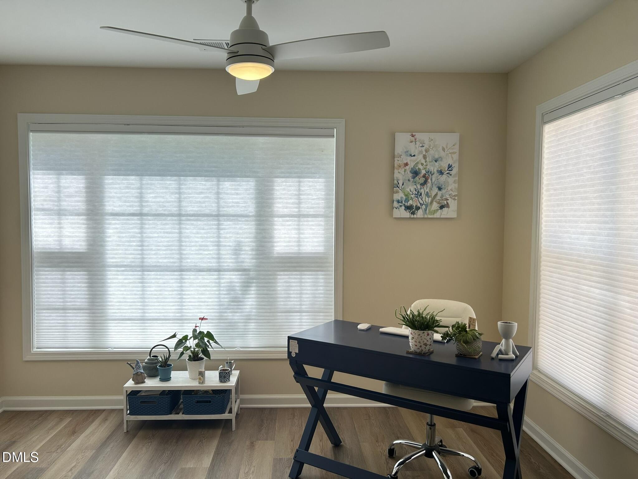 2510 Friedland Place, Unit 102 Raleigh, NC 27617 - Photo 22 of 42 a living room with furniture and window
