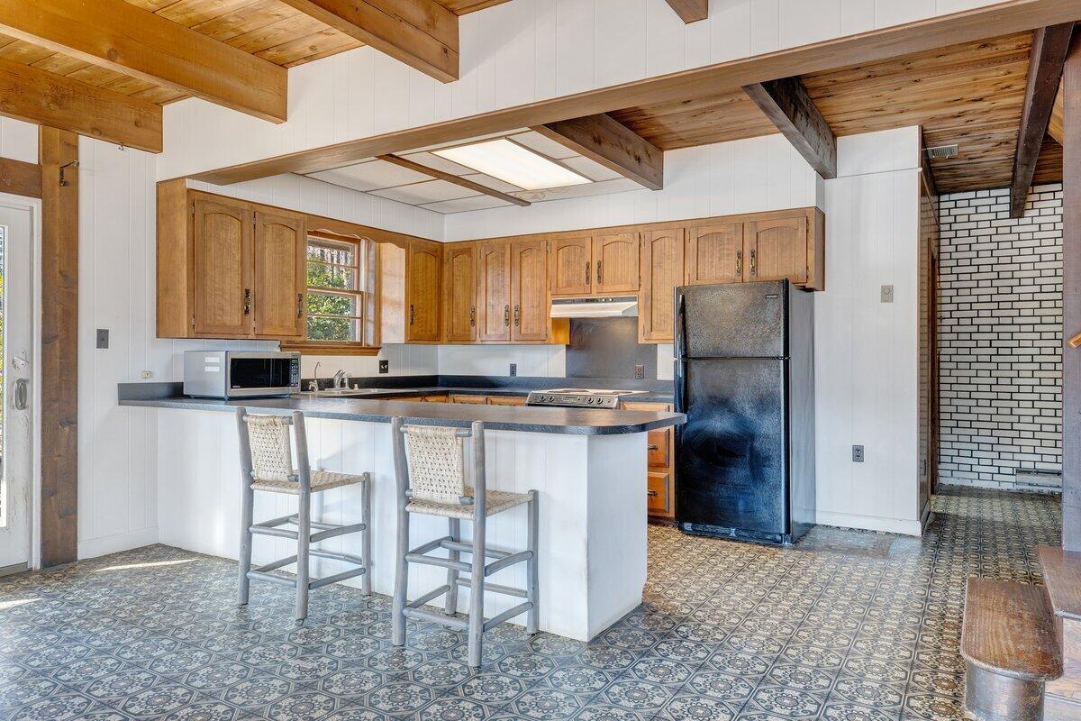 188 Hardy Court Penhook, VA 24137 - Photo 11 of 114 a kitchen with stainless steel appliances granite countertop a refrigerator and a stove top oven