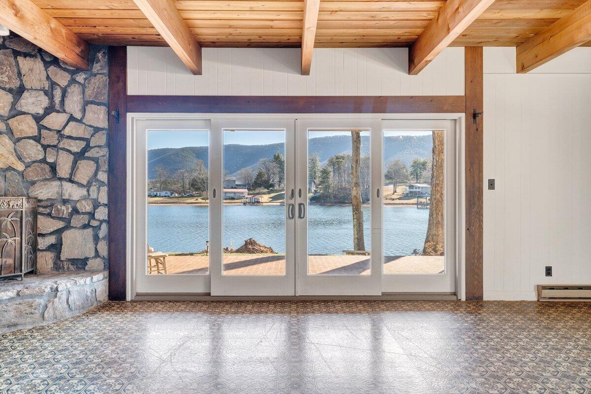 188 Hardy Court Penhook, VA 24137 - Photo 8 of 114 a view of a room with wooden floor and windows