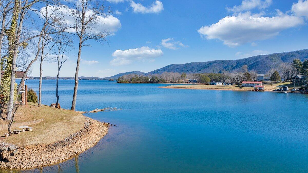 188 Hardy Court Penhook, VA 24137 - Photo 83 of 114 a view of a lake in middle of the house