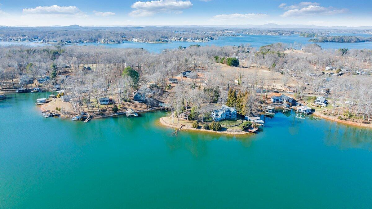 188 Hardy Court Penhook, VA 24137 - Photo 99 of 114 an aerial view of a house with a garden and houses