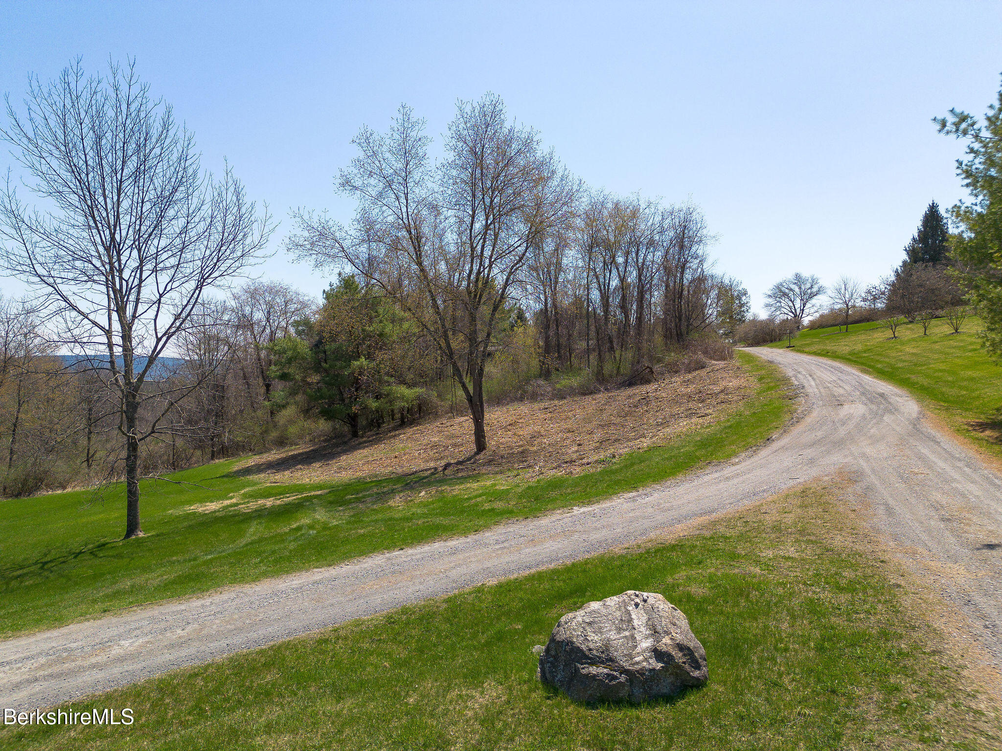 10 Miller View Road Egremont, MA 01230 - Photo 14 of 22 a backyard of a house with lots of green space