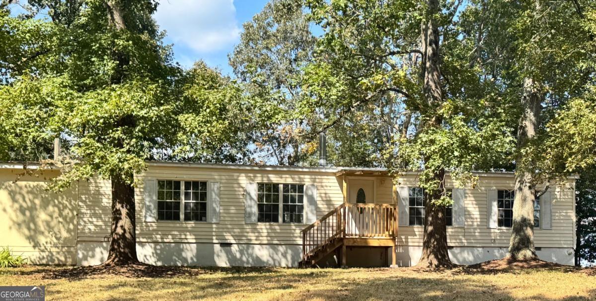905 Adams Duncan Road Hull, GA 30646 - Photo 1 of 1 a view of a house with a patio