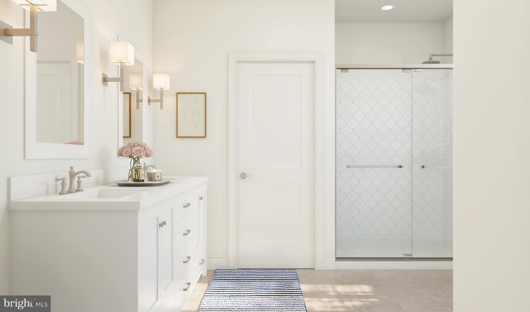 1004 Justin Drive, Unit 1003 West Windsor, NJ 08550 - Photo 14 of 14 a bathroom with a sink and a mirror