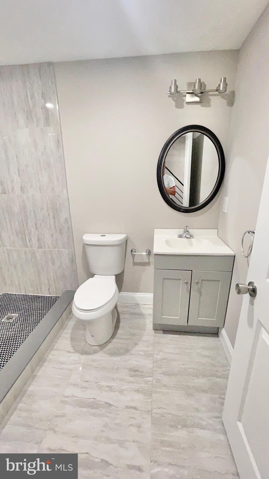 2038 North 20th Street Philadelphia, PA 19121 - Photo 8 of 30 lower level hallway bathroom