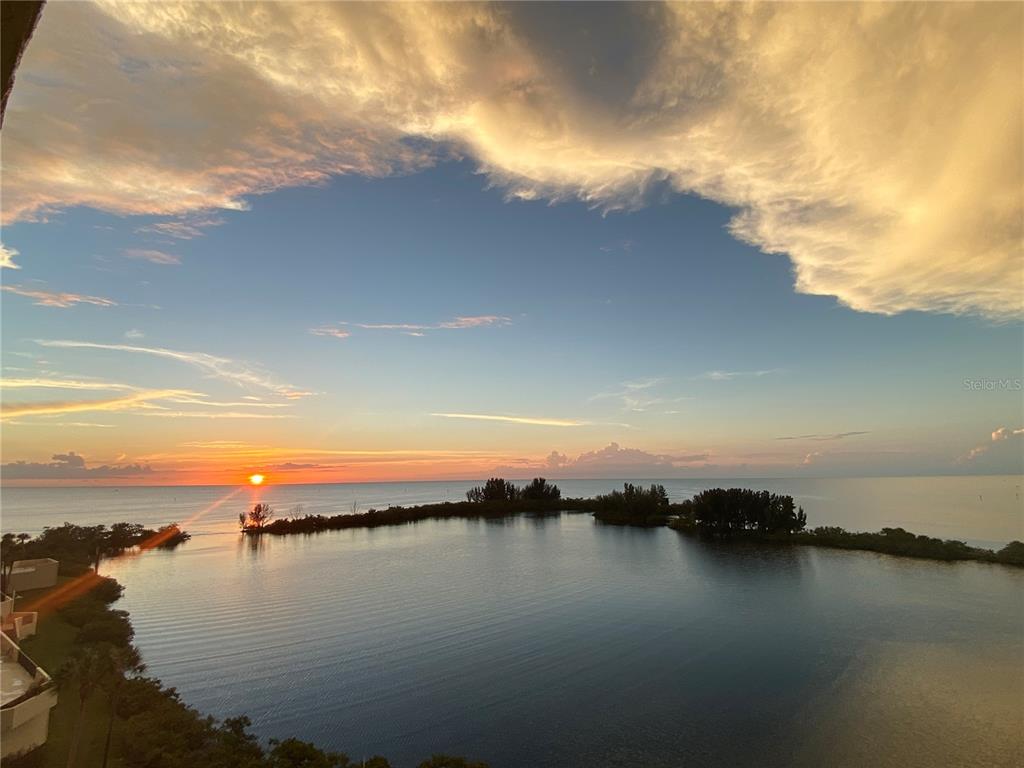 6035 Sea Ranch Drive, Unit 901 Hudson, FL 34667 - Photo 59 of 72 a view of lake and city