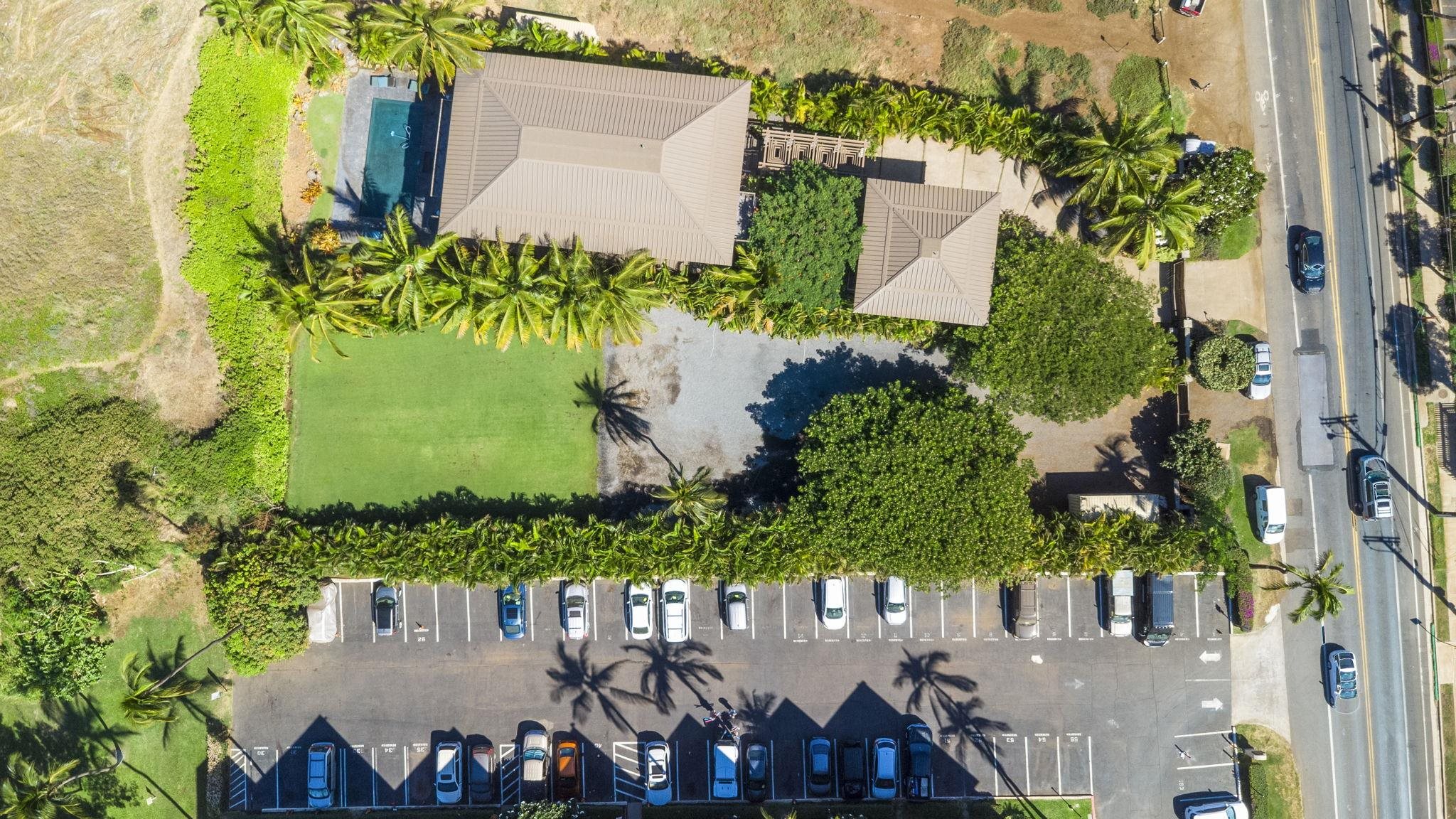 892 South Kihei Road Kihei, HI 96753 - Photo 6 of 22 aerial view of a house with a yard and potted plants