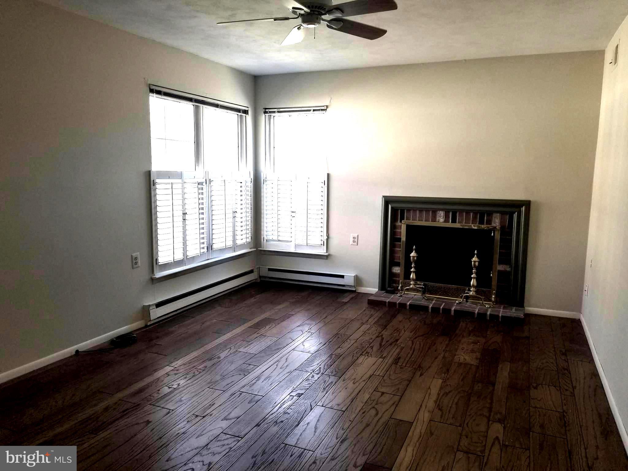 26 Dunstable Road Southampton, NJ 08088 - Photo 14 of 31 wooden floor and fireplace in a room