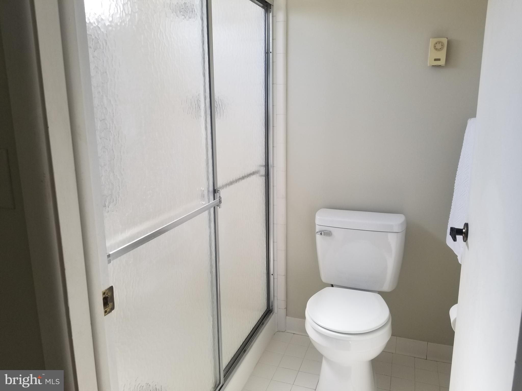 26 Dunstable Road Southampton, NJ 08088 - Photo 19 of 31 a white toilet sitting next to a shower