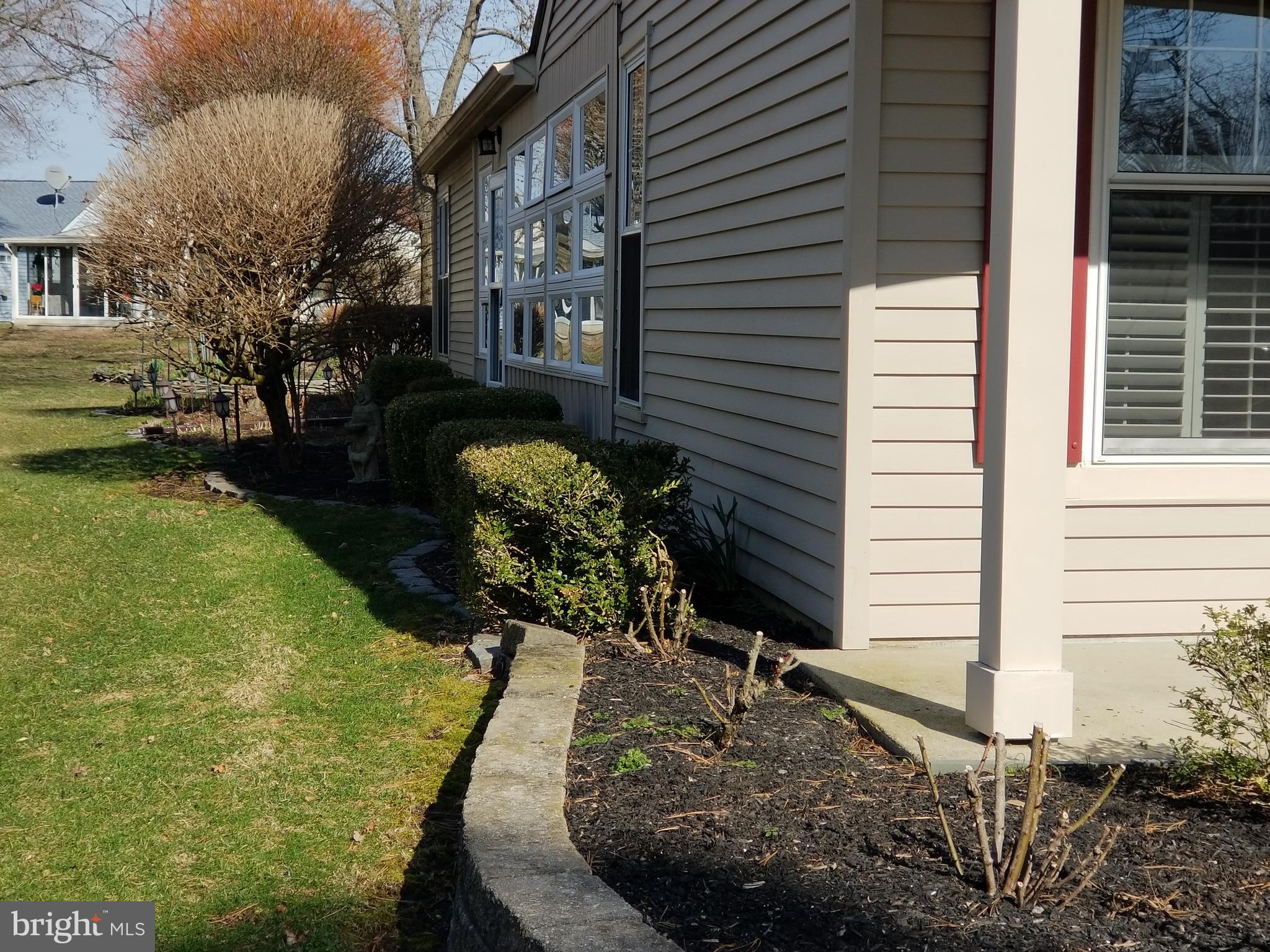 26 Dunstable Road Southampton, NJ 08088 - Photo 2 of 31 a view of a backyard with sitting area