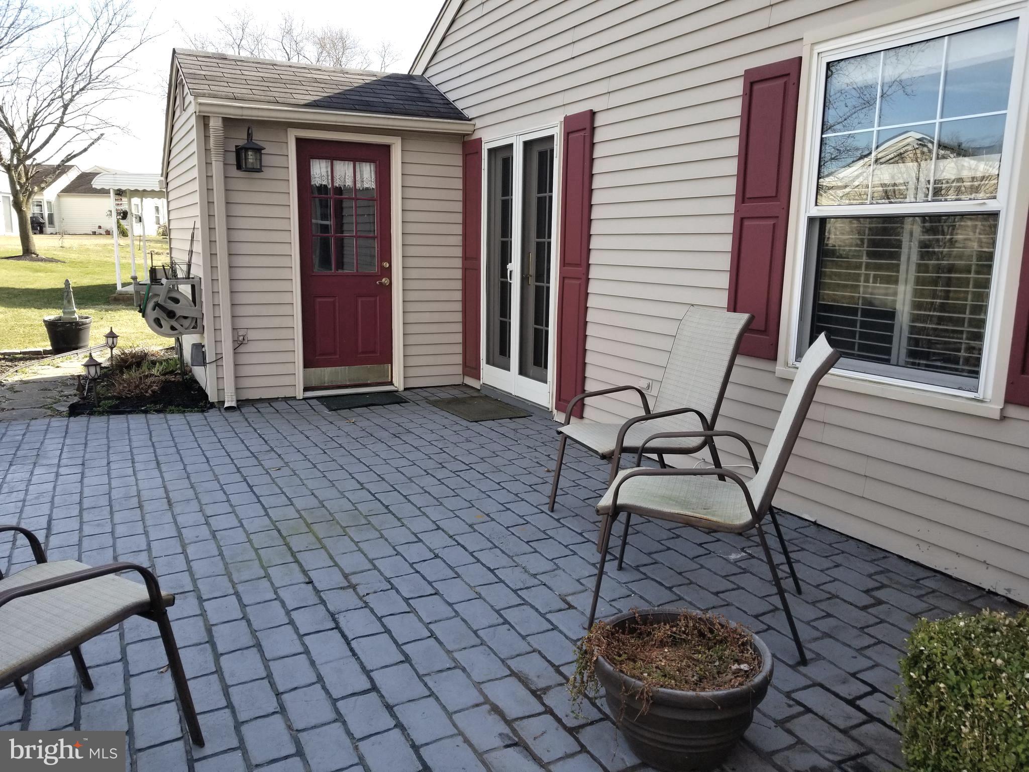26 Dunstable Road Southampton, NJ 08088 - Photo 26 of 31 a view of a terrace with furniture