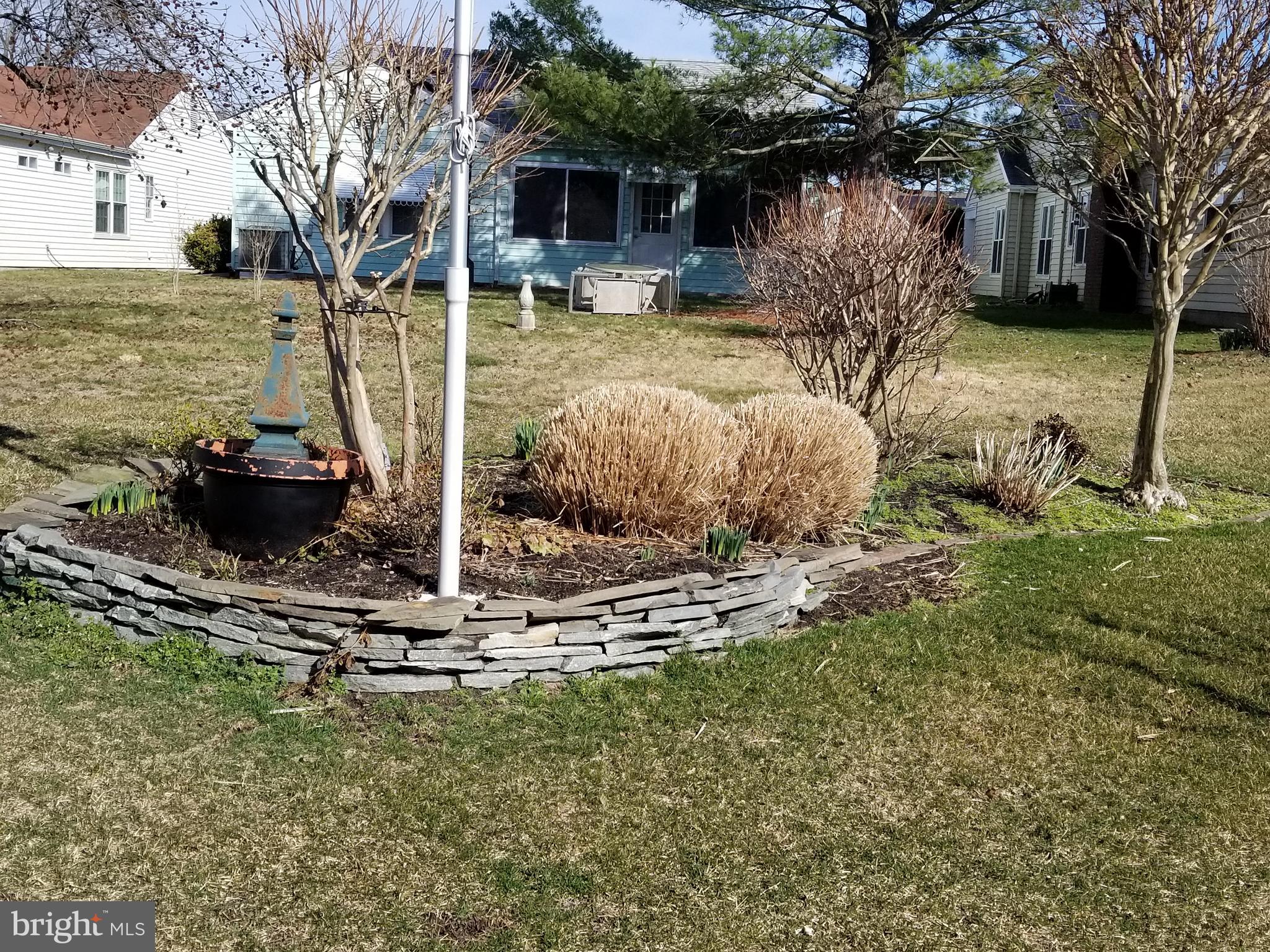 26 Dunstable Road Southampton, NJ 08088 - Photo 29 of 31 a front view of a house with garden